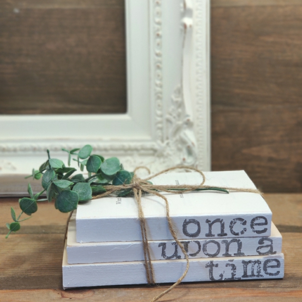 Handmade book stack with greenery